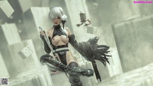 A naked woman standing in front of a giant robot.