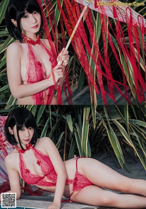 A woman in a pink bodysuit posing for a picture.