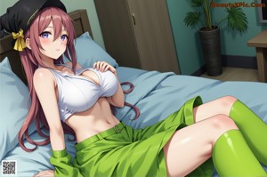 A woman with long black hair sitting on a bed.