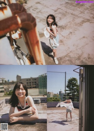 A woman sitting on top of a building next to a wall.